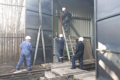 a door being lifted into place