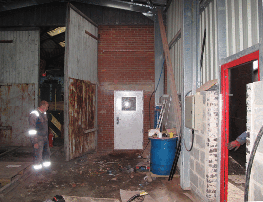 door into the old workshop in place