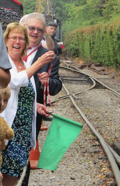 Judith Blake signalling to the locomotive drivers