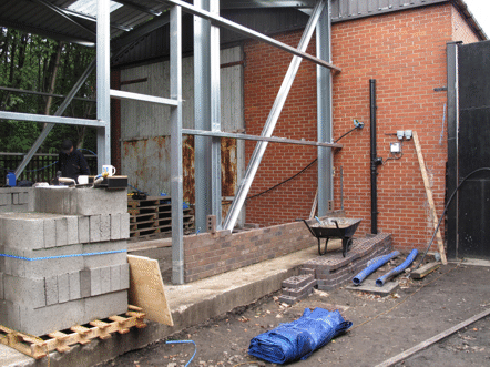 first few courses of bricks laid