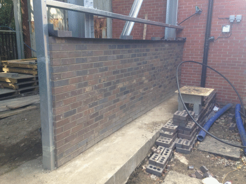 one section of brickwork almost complete