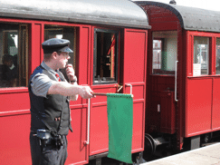The guard setting a train off
